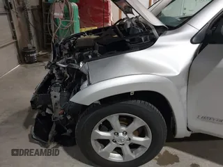 2010 Toyota RAV4 Ltd with VIN 2T3DK4DV2AW018148, listed as a IAAI auction lot 42010664 with 157,117 mi miles. Bid and sale history available at carsss.com. Image 12.