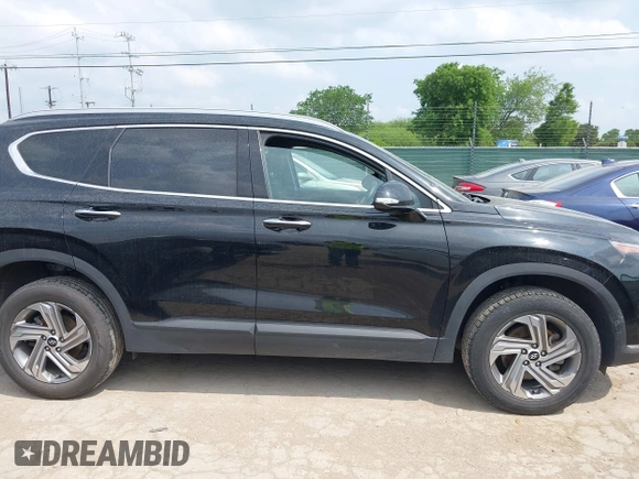 2023 Hyundai Santa Fe SEL with VIN 5NMS2DAJ3PH539322, listed as a IAAI auction lot 42153111 with 61,662 mi miles and . Bid and sale history available at DreamBid. Image 13.