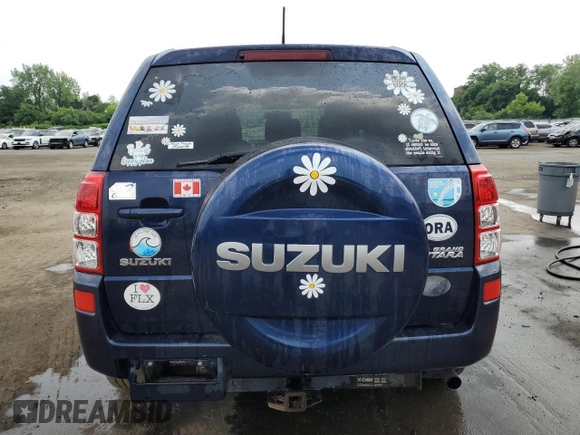 2012 Suzuki Grand Vitara Limited with VIN JS3TD0D74C4100125, listed as a Copart auction lot 58935355 with 218,085 mi miles and Salvage title. Bid and sale history available at DreamBid. Image 6.