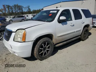 2007 GMC Yukon SLE with VIN 1GKFK13017J109923, listed as a Copart auction lot 77085954 with 214,986 mi miles and Salvage Title. Bid and sale history available at carsss.com. Image 1.