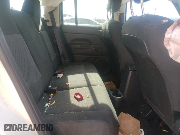 2014 Jeep Patriot Sport with VIN 1C4NJPBB9ED912846, listed as a Copart auction lot 58866985 with 191,195 mi miles and Salvage title. Bid and sale history available at DreamBid. Image 11.