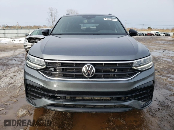 2022 Volkswagen Tiguan SE R-Line Black with VIN 3VV8B7AXXNM106110, listed as a Copart auction lot 43039575 with 24,728 mi miles and Salvage Title. Bid and sale history available at DreamBid. Image 5.