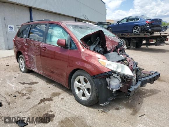 2015 Toyota Sienna LE AAS with VIN 5TDKK3DC3FS585817, listed as a Copart auction lot 52002925 with Not provided miles and Salvage title. Bid and sale history available at DreamBid. Image 4.