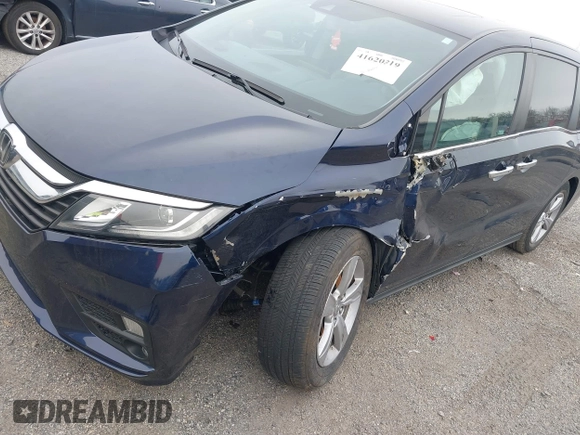 2020 Honda Odyssey EX-L with VIN 5FNRL6H70LB055122, listed as a IAAI auction lot 41620219 with 129,582 mi miles. Bid and sale history available at carsss.com. Image 6.
