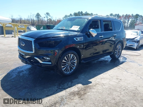2019 Infiniti QX80 Luxe with VIN JN8AZ2NE1K9234497, listed as a IAAI auction lot 41833481 with 126,754 mi miles and . Bid and sale history available at DreamBid. Image 2.