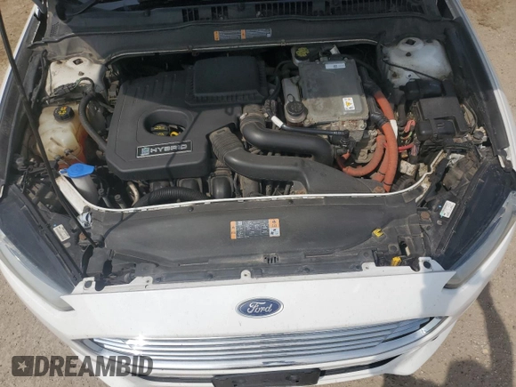 2013 Ford Fusion SE Hybrid z VIN 3FA6P0LU7DR245720, wystawiony jako Copart lot #60231425 z przebiegiem 249 180 mil mil oraz Czysty tytuł • Clean title. Historia ofert i sprzedaży dostępna na DreamBid. Obrazek 11.