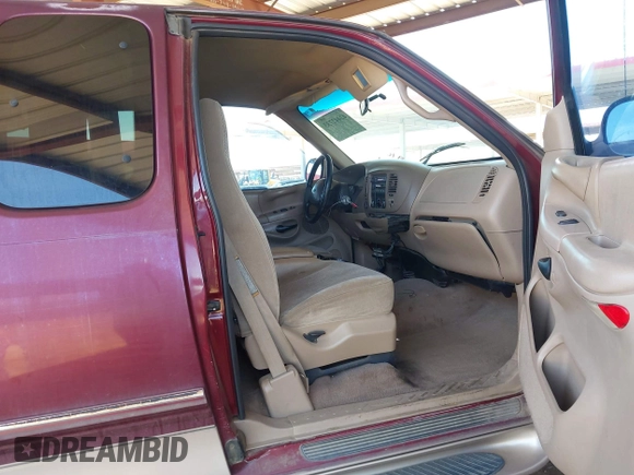 1998 Ford F-150 with VIN 1FTZX18WXWNC06973, listed as a IAAI auction lot 42442733 with 196,754 mi miles and . Bid and sale history available at DreamBid. Image 5.