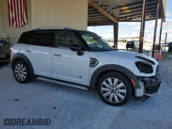 2019 MINI Countryman Cooper S with VIN WMZYT5C59K3E63967, listed as a Copart auction lot 73022644 with 56,638 mi miles and Salvage Title. Bid and sale history available at carsss.com. Image 4.