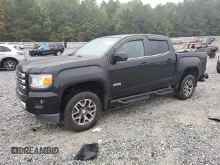 2015 GMC Canyon 4WD SLE with VIN 1GTG6BE37F1157166, listed as a Copart auction lot 71279914 with 114,484 mi miles and Salvage Title. Bid and sale history available at carsss.com. Image 1.