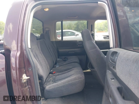 2004 Dodge Dakota SLT with VIN 1D7HG48NX4S649522, listed as a IAAI auction lot 42580132 with 124,037 mi miles and . Bid and sale history available at DreamBid. Image 8.