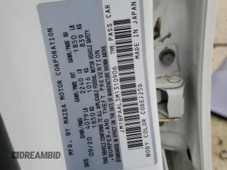 2021 Mazda 3 S with VIN JM1BPAAL3M1310906, listed as a Copart auction lot 52217105 with Not Provided miles and Salvage Title. Bid and sale history available at DreamBid. Image 14.