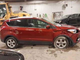 2015 Ford Escape SE with VIN 1FMCU0GX3FUB12115, listed as a IAAI auction lot 41282103 with 191,231 mi miles and . Bid and sale history available at DreamBid. Image 13.