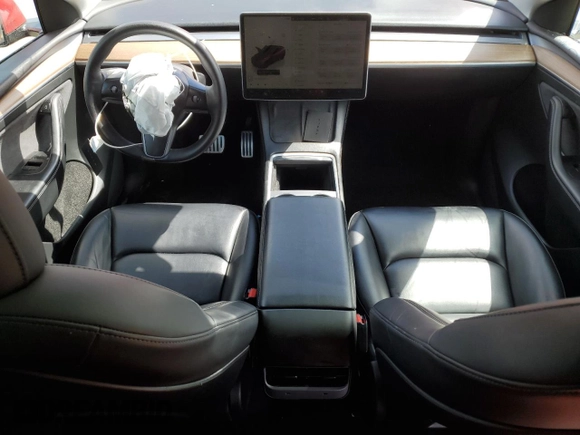 2023 Tesla Model Y Performance z VIN 7SAYGDEF2PF591238, wystawiony jako Copart lot #51991025 z przebiegiem 44 749 mil mil oraz Szkoda całkowita • Salvage title. Historia ofert i sprzedaży dostępna na DreamBid. Obrazek 8.