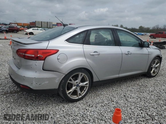 2016 Ford Focus Titanium with VIN 1FADP3J22GL354941, listed as a Copart auction lot 54401135 with 144,142 mi miles and Salvage title. Bid and sale history available at DreamBid. Image 3.