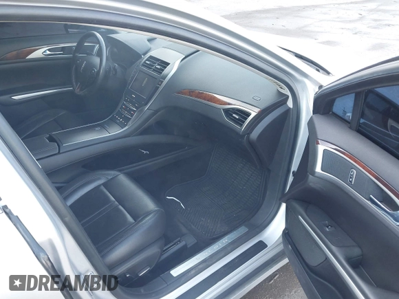 2014 Lincoln MKZ with VIN 3LN6L2G99ER808853, listed as a IAAI auction lot 42157083 with 157,696 mi miles. Bid and sale history available at carsss.com. Image 5.
