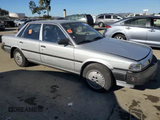 1988 Toyota Camry z VIN JT2SV24E5J3276324, wystawiony jako Copart lot #88117355 z przebiegiem 89 928 mil mil oraz Szkoda całkowita • Salvage title. Historia ofert i sprzedaży dostępna na DreamBid. Obrazek 4.