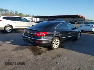 2011 Volkswagen CC Sport with VIN WVWMN7AN9BE729108, listed as a IAAI auction lot 41729512 with 138,044 mi miles. Bid and sale history available at carsss.com. Image 4.