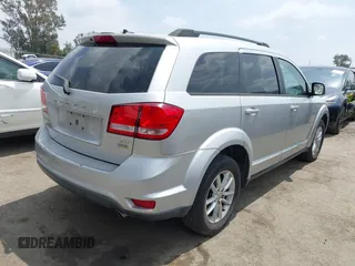 2013 Dodge Journey SXT with VIN 3C4PDCBG9DT506384, listed as a IAAI auction lot 42119685 with 143,769 mi miles. Bid and sale history available at carsss.com. Image 4.