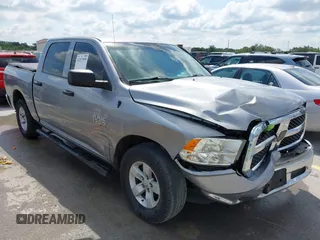 2019 Ram 1500 Tradesman z VIN 3C6RR6KG0KG705946, wystawiony jako IAAI lot #42217999 z przebiegiem 99 460 mil mil oraz . Historia ofert i sprzedaży dostępna na DreamBid. Obrazek 1.