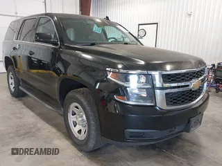 2016 Chevrolet Tahoe Commercial z VIN 1GNSKFEC4GR332030, wystawiony jako IAAI lot #42488829 z przebiegiem 135 574 mil mil oraz . Historia ofert i sprzedaży dostępna na DreamBid. Obrazek 1.