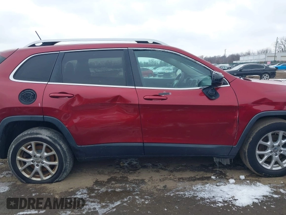 2014 Jeep Cherokee Latitude with VIN 1C4PJMCS2EW175306, listed as a IAAI auction lot 41620115 with 156,578 mi miles and . Bid and sale history available at carsss.com. Image 13.