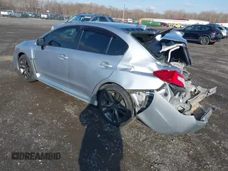 2016 Subaru WRX Premium with VIN JF1VA1E65G9810998, listed as a IAAI auction lot 41545599 with 123,135 mi miles. Bid and sale history available at carsss.com. Image 3.