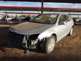 2011 Ford Fusion Hybrid with VIN 3FADP0L35BR256789, listed as a IAAI auction lot 40737584 with 133,683 mi miles. Bid and sale history available at carsss.com. Image 18.