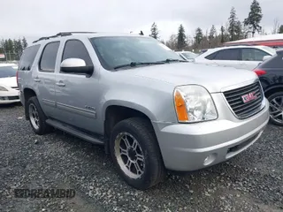 2012 GMC Yukon SLT with VIN 1GKS2CE03CR324366, listed as a IAAI auction lot 41473131 with 161,847 mi miles. Bid and sale history available at carsss.com. Image 1.