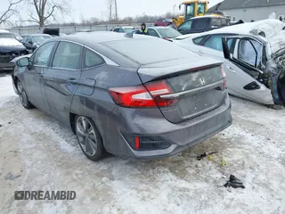 2018 Honda Clarity z VIN JHMZC5F13JC006627, wystawiony jako IAAI lot #41335364 z przebiegiem 58 662 mil mil oraz . Historia ofert i sprzedaży dostępna na DreamBid. Obrazek 3.