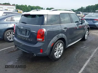 2020 MINI Countryman Cooper S with VIN WMZYW7C0XL3L85463, listed as a IAAI auction lot 42344478 with 54,654 mi miles and . Bid and sale history available at DreamBid. Image 4.