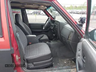 1999 Jeep Cherokee Sport with VIN 1J4FF68SXXL670160, listed as a IAAI auction lot 42265237 with 197,390 mi miles and . Bid and sale history available at DreamBid. Image 5.
