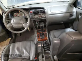 2002 Suzuki Grand Vitara JLX z VIN JS3TD62V524160739, wystawiony jako Copart lot #88416995 z przebiegiem 98 820 mil mil oraz Szkoda całkowita • Salvage title. Historia ofert i sprzedaży dostępna na DreamBid. Obrazek 8.