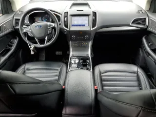 2020 Ford Edge SEL z VIN 2FMPK3J90LBB01559, wystawiony jako Copart lot #61365305 z przebiegiem 120 050 mil mil oraz Czysty tytuł • Clean title. Historia ofert i sprzedaży dostępna na DreamBid. Obrazek 8.