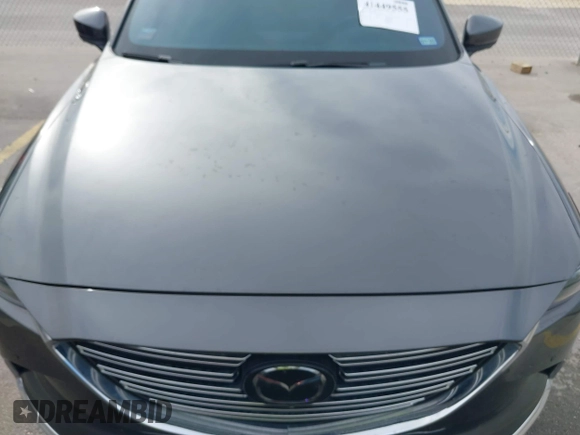 2023 Mazda CX-9 Grand Touring z VIN JM3TCBDY0P0631395, wystawiony jako IAAI lot #41449555 z przebiegiem 17 721 mil mil oraz . Historia ofert i sprzedaży dostępna na DreamBid. Obrazek 6.