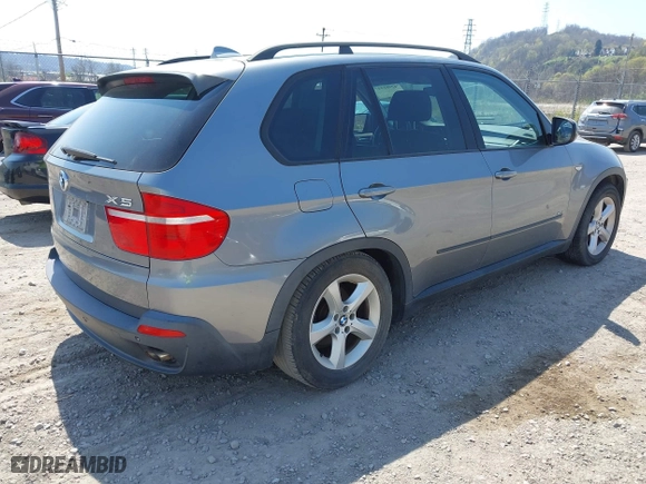 2007 BMW X5 3.0si with VIN 5UXFE43557L013585, listed as a IAAI auction lot 42081447 with 0 mi miles. Bid and sale history available at carsss.com. Image 4.