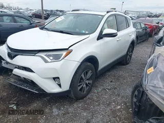 2018 Toyota RAV4 XLE with VIN JTMRFREV8JJ225065, listed as a IAAI auction lot 41940678 with 145,074 mi miles. Bid and sale history available at carsss.com. Image 2.