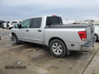 2011 Nissan Titan SL with VIN 1N6AA0ED2BN305628, listed as a Copart auction lot 85012324 with 188,329 mi miles and Salvage Title. Bid and sale history available at carsss.com. Image 2.