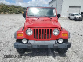 2003 Jeep Wrangler Sport with VIN 1J4FA49S83P369892, listed as a Copart auction lot 56536745 with 182,535 mi miles and Salvage title. Bid and sale history available at DreamBid. Image 5.