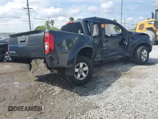 2010 Nissan Frontier Pro-4X with VIN 1N6AD0EV2AC401933, listed as a Copart auction lot 53980575 with 188,170 mi miles and Salvage title. Bid and sale history available at DreamBid. Image 3.