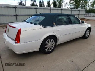 2006 Cadillac DTS 1SD z VIN 1G6KD57Y86U146074, wystawiony jako Copart lot #52917235 z przebiegiem 133 956 mil mil oraz Tytuł czysty. Historia ofert i sprzedaży dostępna na DreamBid. Obrazek 3.
