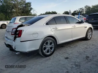 2019 Ford Taurus SEL with VIN 1FAHP2E82KG114879, listed as a Copart auction lot 80266574 with 75,561 mi miles and Salvage Title. Bid and sale history available at DreamBid. Image 3.