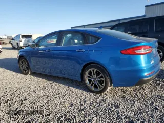 2020 Ford Fusion SEL with VIN 3FA6P0CD6LR131061, listed as a Copart auction lot 53372315 with 122,120 mi miles and Salvage title. Bid and sale history available at DreamBid. Image 2.