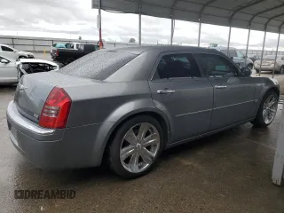 2006 Chrysler 300 C with VIN 2C3KA63H26H218136, listed as a Copart auction lot 49209315 with 215,682 mi miles and Salvage Title. Bid and sale history available at carsss.com. Image 3.