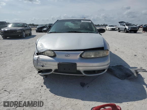 2003 Oldsmobile Alero GL1 z VIN 1G3NL52F93C314163, wystawiony jako Copart lot #46096355 z przebiegiem 230 673 mil mil oraz Szkoda całkowita • Salvage title. Historia ofert i sprzedaży dostępna na DreamBid. Obrazek 5.
