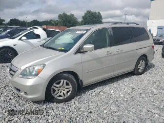 2006 Honda Odyssey EX-L z VIN 5FNRL38726B027177, wystawiony jako Copart lot #55780985 z przebiegiem 154 377 mil mil oraz Czysty tytuł • Clean title. Historia ofert i sprzedaży dostępna na DreamBid. Obrazek 1.