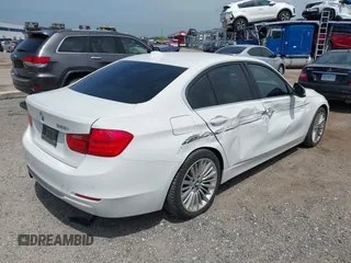 2012 BMW 3 Series 328i with VIN WBA3A5C51CF348290, listed as a IAAI auction lot 41867281 with 100,757 mi miles. Bid and sale history available at carsss.com. Image 4.
