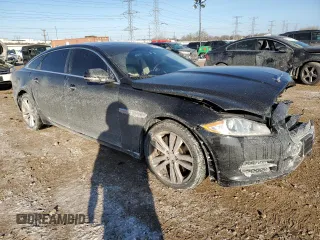 2014 Jaguar XJ Portfolio with VIN SAJWJ2GD6E8V73491, listed as a Copart auction lot 42472345 with 68,747 mi miles and Salvage title. Bid and sale history available at DreamBid. Image 4.