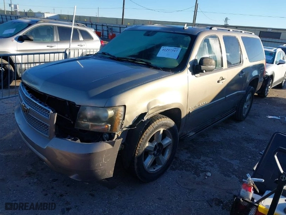 2007 Chevrolet Suburban LS with VIN 1GNFC16037J337224, listed as a IAAI auction lot 41297347 with 256,162 mi miles. Bid and sale history available at carsss.com. Image 2.