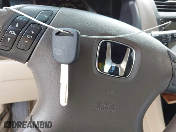 2005 Honda Accord EX with VIN 1HGCM56725A007330, listed as a IAAI auction lot 42240294 with 198,288 mi miles and . Bid and sale history available at DreamBid. Image 11.