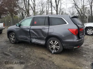 2016 Honda Pilot EX-L with VIN 5FNYF6H54GB084405, listed as a Copart auction lot 82630024 with 169,492 mi miles and Salvage Title. Bid and sale history available at carsss.com. Image 2.